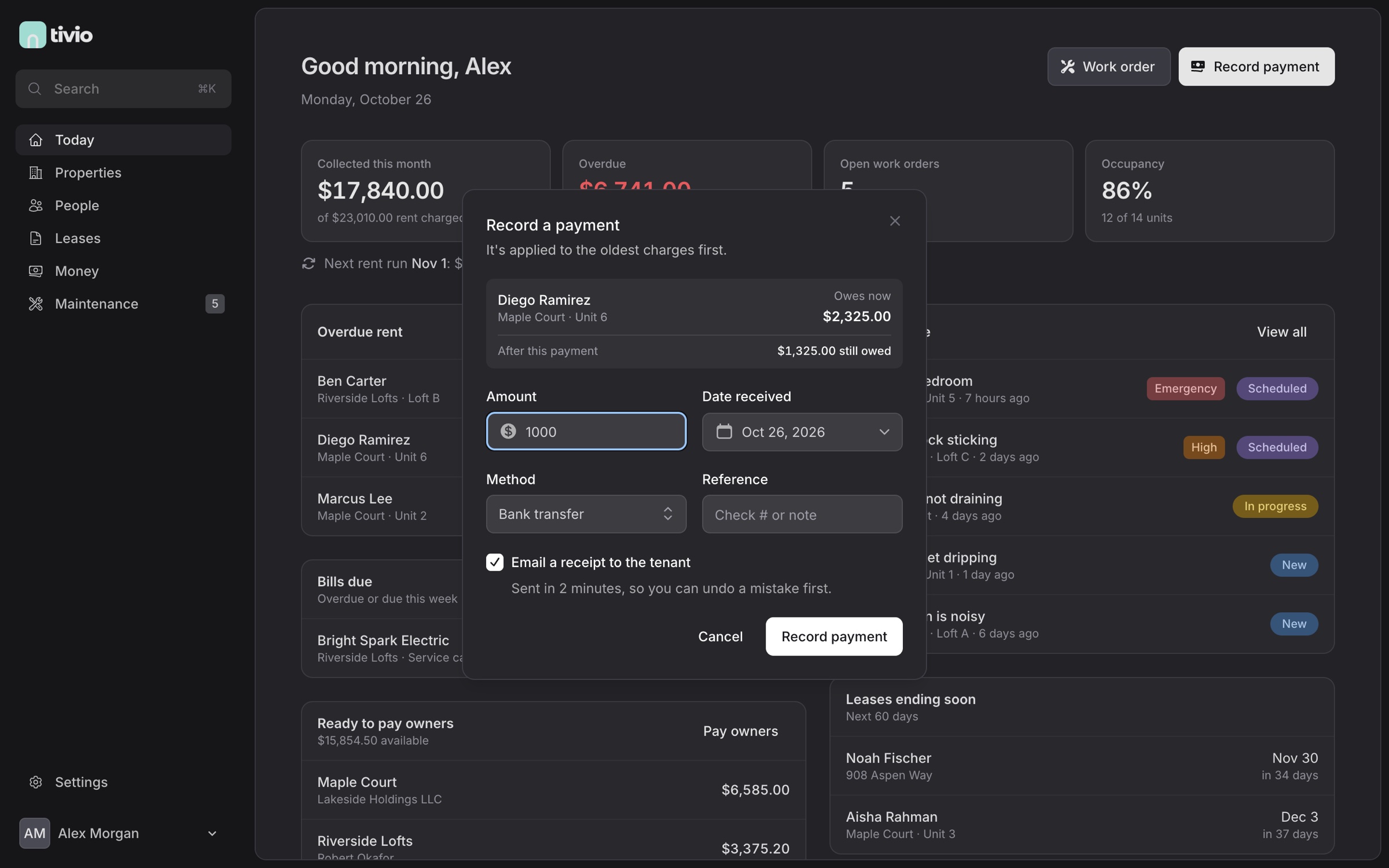 Recording a $1,000 payment for a tenant who owes $2,325. The dialog shows $1,325 still owed after the payment.